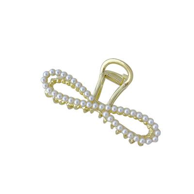 China Hollow Rhinestone Bowknot Metal Hair Clip Pearl Rhinestone Hairpin Alloy Temperament Hook Clip Hair Accessory For Girls for sale