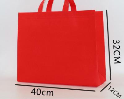 China BIODEGRADABLE manufacturers wholesale clothing store shopping bags advertising gift bags can be printed LOGO coated non-woven bags for sale