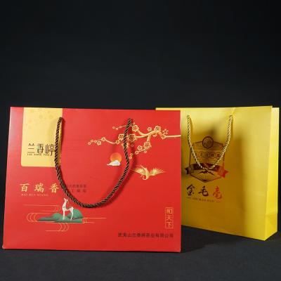 China Recyclable Customized Colorful Paper Bag Fancy Gift Bag With Handles Festival Handbag for sale