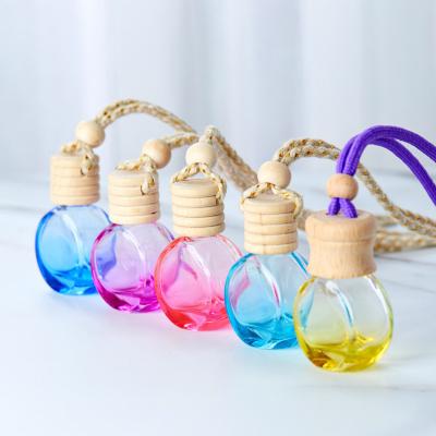 China 5Ml/8Ml/10Ml Luxury Clear Empty Car Air Freshener Glass Bottle Car Air Freshener Hanging Perfume Bottle for sale