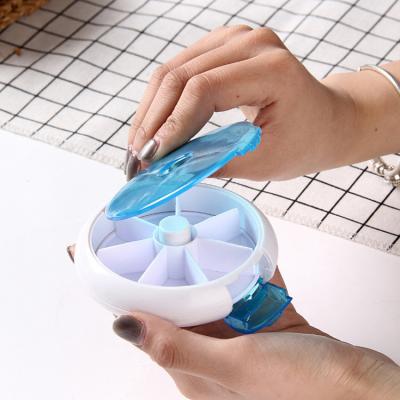 China Eco - Friendly ABS Rotating Plastic Fruit Weekly 7 Slots Around Pill Box for sale