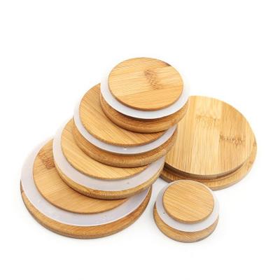 China Non Refillable Customized Round Bamboo Wooden Lid Jar Bamboo Lid For Water Bottle for sale