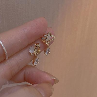 China Yiwu FASHIONABLE Crystal Rhinestone Drop Earrings Women Shining Exquisite 14k Cat Eye Stone Diamond Earrings Gold Plated for sale