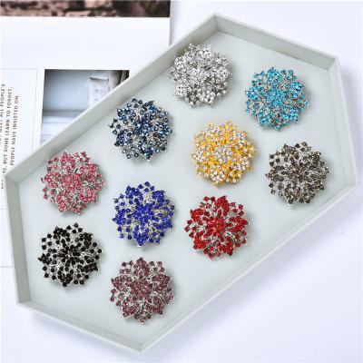 China 2022 New Crystal Style Brooches Women Custom Crystal Bauhinia Flower Shape Brooch Pins For Wedding Jewelry for sale