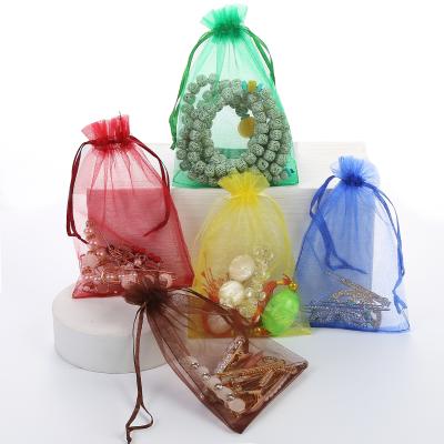 China Jewelry Organza Pouches Drawstring Pouch Organza Retail Gift Cosmetic Bags For Digital Products Goods In Stock for sale