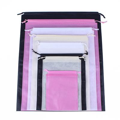 China Amazon Stock 30*40CM Recyclable Nonwoven Gloves Gift Ice Cream Drawstring Bags Pink Black Beige for sale