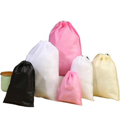 China Recyclable Stock 20*28CM Logo Gift Ice Crampon Drawstring Custom Cheap Nonwoven Bag Pink Black Beige for sale