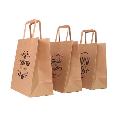 China Recycled Materials Personalized Printing Stock Black 21*25Cm Brown Thank You Kraft Paper Bags With Flower Leave for sale