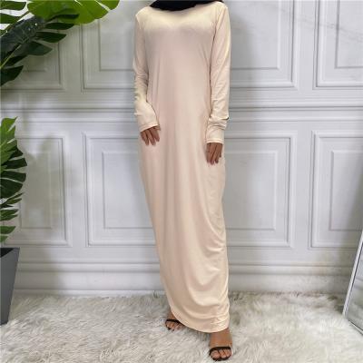 China Viable Pure Silk Muslim Women Abaya Long Sleeve Milk Color Dubai Muslim Dress For Muslim Women for sale