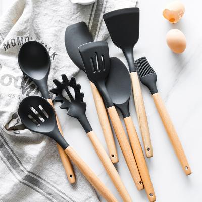 China Viable Wholesale Cookware Silicone Kitchen Dish Tools Spatula Stir-Fry Leak Shovel Cookware Set Wooden Handle 1788 for sale