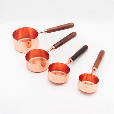 China Amazon Viable Hot Sale Stainless Steel Rose Gold Measuring Cups Set with Silicone Handle for Kitchen 1261 for sale