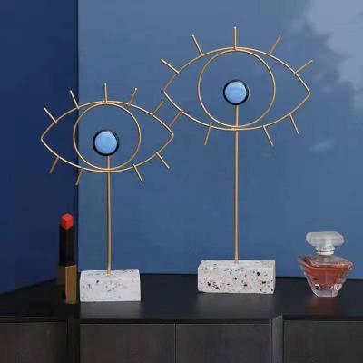 China Nordic Luxury Europe Iron Resin Blue Eyes Jewelry Stand For Model Home for sale