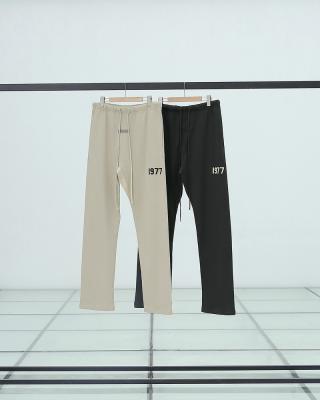 China Anti-wrinkle 1977 fear of god grassroots joggling two-line casual pants sports pants for women men unisex for sale