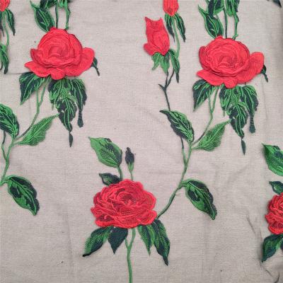 China Red Color Water Soluble 3D Large Rose Embroidery Fabric Nigerian Embroidery Lace Up Fabric 2022 for sale