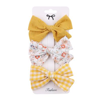 China Custom Sales Decoration Girls Handmade Cloth Bow Hair Clip Treasure Cloth Bow Headdress Side Clip for sale