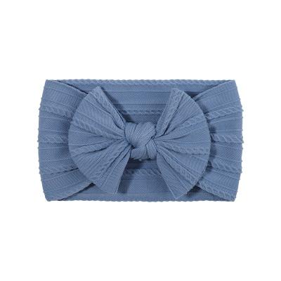 China Baby Girls Bow Decoration Super Soft Jacquard Fabric Headband Elastic Wide Bent Overhead Headband for sale