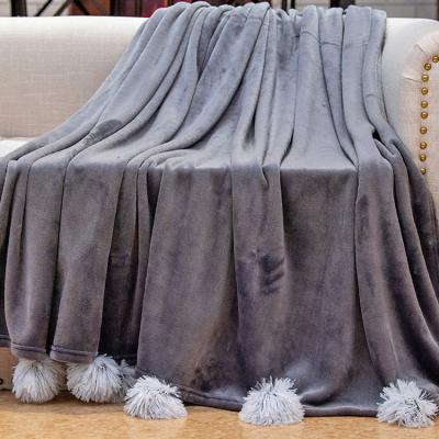 China Anti-pilling Solid Pompom Blanket Gift Throw Fuzzy Sofa Throws For Living Room for sale