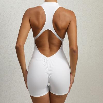 China Nylon ammonia blend Seamless Tight Fit with Zipper Sports Yoga Pants Honey Peach Hip One Piece Quick Drying Pleated Fitness Jumpsuit for sale