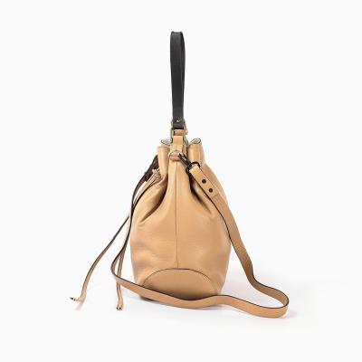 China Custom Women's Handbag Fashion PU Drawstring Bucket and Leather Shoulder Bag for sale