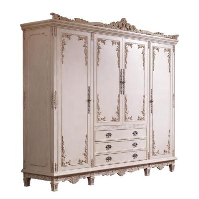 China Handcrafted Carved Wood Customized Handcrafted Carved Royal Wood White Wardrobe Bedroom Furniture Set With Carvings for sale