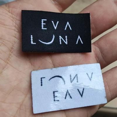 China Hot Iron On Iron On Clothing Labels 500PCS, 2.5 * 4cm Custom Hot Melt Glue Black Cloth Label Directly Cut Labels for sale