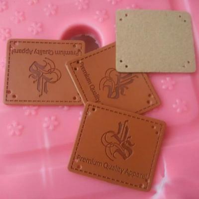 China Washable Leather Patches Labels 1000PCS, 3.5*4 cm Custom PU Leather Labels Emboss Square Jeans Label for sale