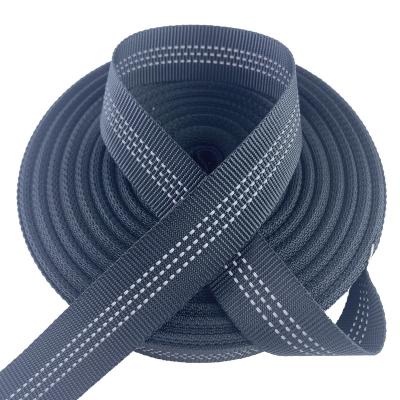 China The new stock 1-inch polyester reflective belt glows in the dark. Black polyester webbing for backpack for sale