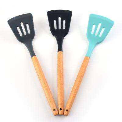 China Eco-Friendly Silicone Kitchenware Kitchenware Main Kitchen Utensil Spatula Sustainable Appliances With Wooden Handle for sale