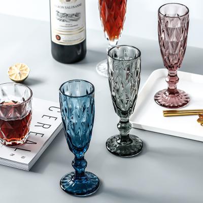 China 1019-1 Viable Colored Vintage Green Embossed Factory Sales Promotional Glass Wine Juice Creative Goblet for sale