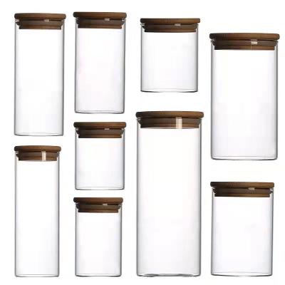 China 828-24 Reusable Kitchen Tools Bamboo Lid For Tube Shaped Storage Glass Jar For Spice Glass Jar for sale