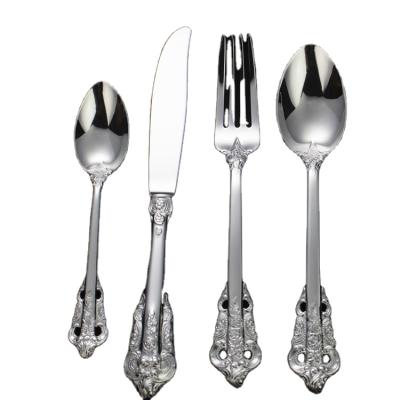 China Amazon viable hot sale 4pcs embossed luxury cubiertos spoon fork set stainless steel flatware sets for sale