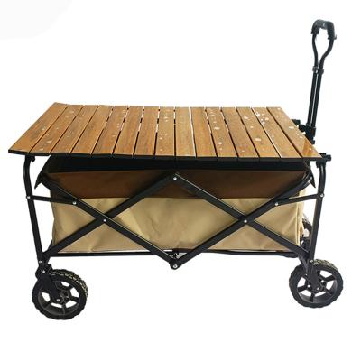 China DC-7803-T Storage Iron Folding Wheel Beach Cart Wholesale Beach Cart Sand Tires Cart Stroller With Table Top for sale