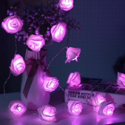 China Beautiful Wedding Party Decoration PVC Indoor Outdoor Clear Wire Battery Operated Rose LED String Lights for sale