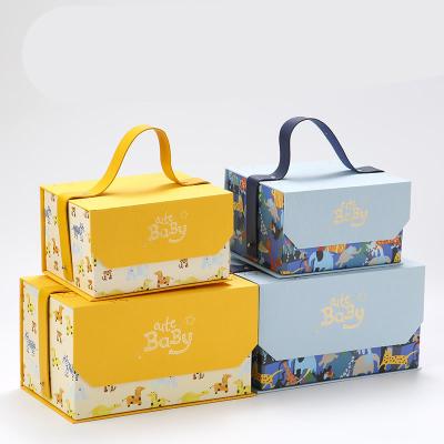 China Wholesale Recyclable Cute Blue Yellow Cartoon Cardboard Gift Box Kids Birthday Cover Magnetic Clothing Packaging Gift Box With Handle for sale