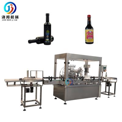 China JB-YG6 GARMENT automatic liquor/red wine/alcohol/glass bottle filling line/bottling machine for sale