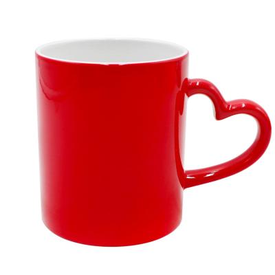 China Viable Heat Sensitive Color Changing Magic Black Sublimation Heart Handle Ceramic Coated Mug With Customized for sale