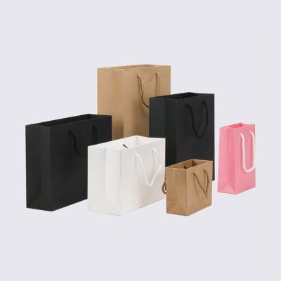 China Brown Paper Recyclable Kraft Paper Shopping Bag Custom Logo Hot Sale Take Out Bag for sale