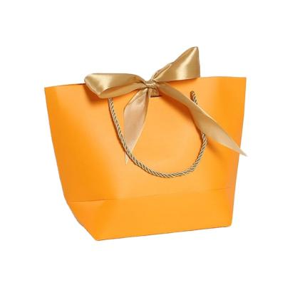 China Wholesale Recyclable Custom Printed Orange Luxury Jewelry Clothing Boutique Brand Retail Packaging Gift Shopping Paper Bag With Logo for sale