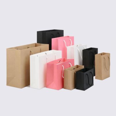 China Amazon Recyclable Hot Sale Free Sample Accept Custom Brand Kraft Paper Shopping Bag for sale