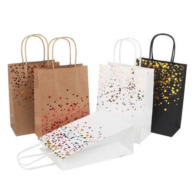 China Recyclable Custom Printing Gold Foil Logo Brown Kraft Paper Bag Gift Shopping Paper Bag for sale