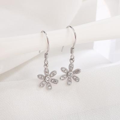 China High Quality 999 Sterling Silver Vintage Flower Women's Niche Diamond Stud Earrings Creative for sale