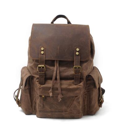 China 2022 Retro Wax Men's Canvas Genuine Leather Backpack School Drawstring Backpack High Quality Waterproof Leather Outdoor Bag Travel Anti-theft for sale