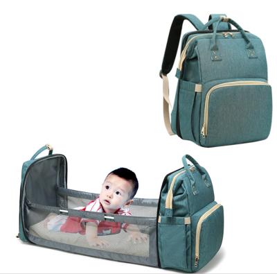 China 2021 Waterproof Maternity Nursing Bags Folds Anti-theft Tote Bag Stroller Nappy Bag Handbag Bed Backpack Diaper Bag With Cradle for sale