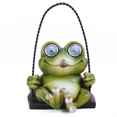 China Europe Beautiful Lamp Border Creative Solar Animal Decoration Swing Frog Resin Ornament for sale