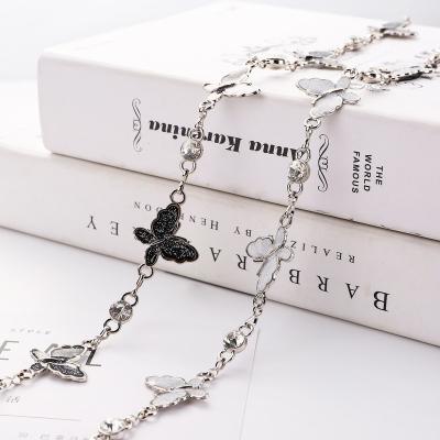 China Trendy Fashion White Black Butterfly For Lady Dress Metal Waist Chain Crystal Chain Sashes Belt Silver Woman for sale