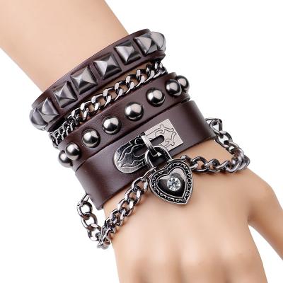 China Couple Bracelets New Fashion 2 Piece Vintage Style Couple Bracelets Master Heart Lover Rivet Decorated Rivet Black /Brown Color Leather Bracelets for sale