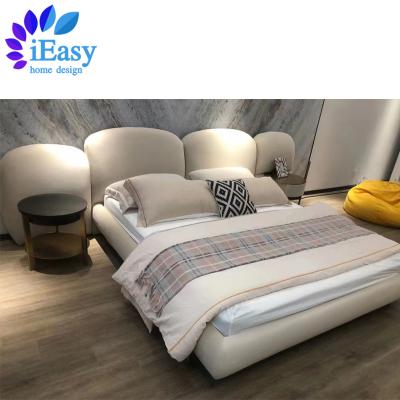 China Adjustable (height) iEasy modern stone simple atmosphere villa hotel elegant big headboard fabric bed italian light luxury bed designer furniture for sale