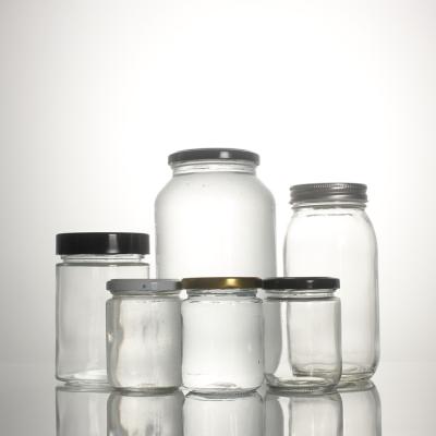 China CANDY Stored Clear Glass Food Storage 1oz 3oz 6 oz 12 oz 16oz 26oz Jar With Metal Cap Lids for sale