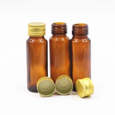 China 28mm Pharmaceutical Empty Amber Round 50ml Glass Oral Liquid Syrup Medical Bottles With Aluminum Screw Cap for sale