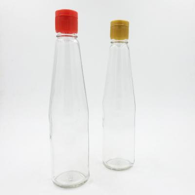 China 2021 Wholesale Cheap Transparent Storage Olive Oil Glass Bottle With Lid Small Glass Bottles With Cork Lids for sale